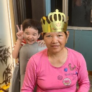 My daughter snuck a laugh behind Grandma. cover